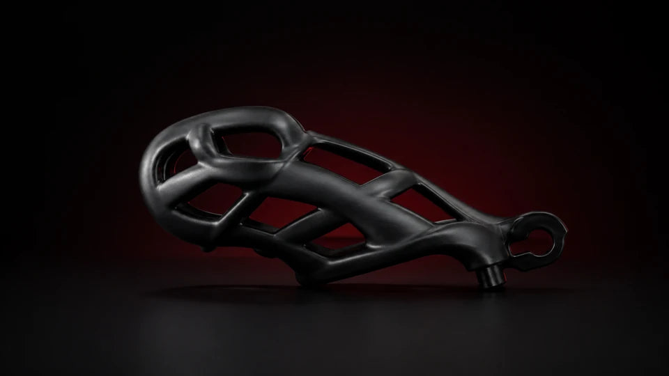 Black KINK3D cage against a smooth dark background with subtle red lighting