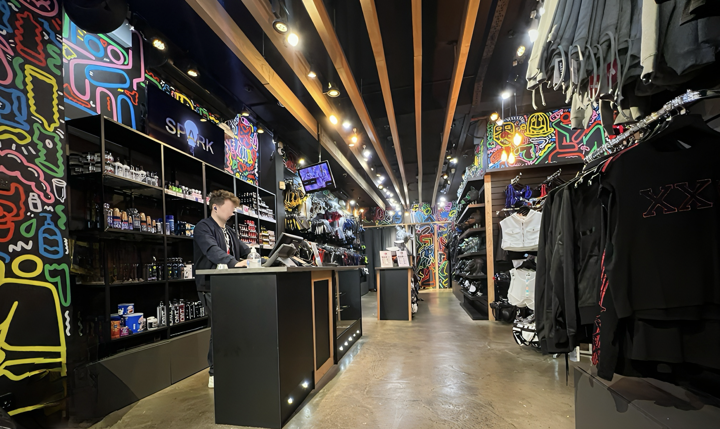 An image showing Clonezone Soho, where customers can come to be custom-fit and measured by trained team members for KINK3D chastity cages. The image shows the Clonezone SOho tillpoint.